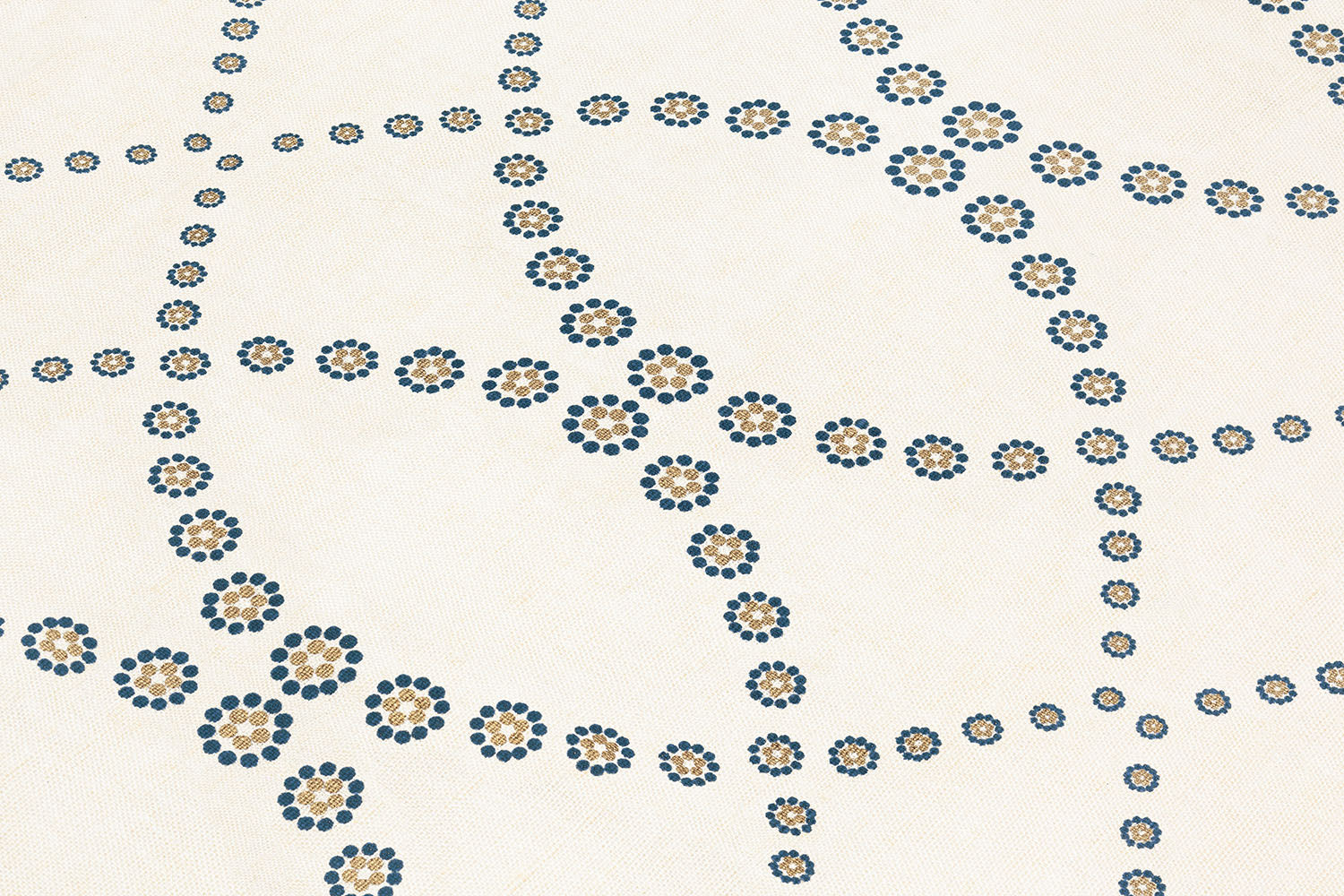 Fabric yardage in a playful floral lattice print in yellow and navy on a cream field.