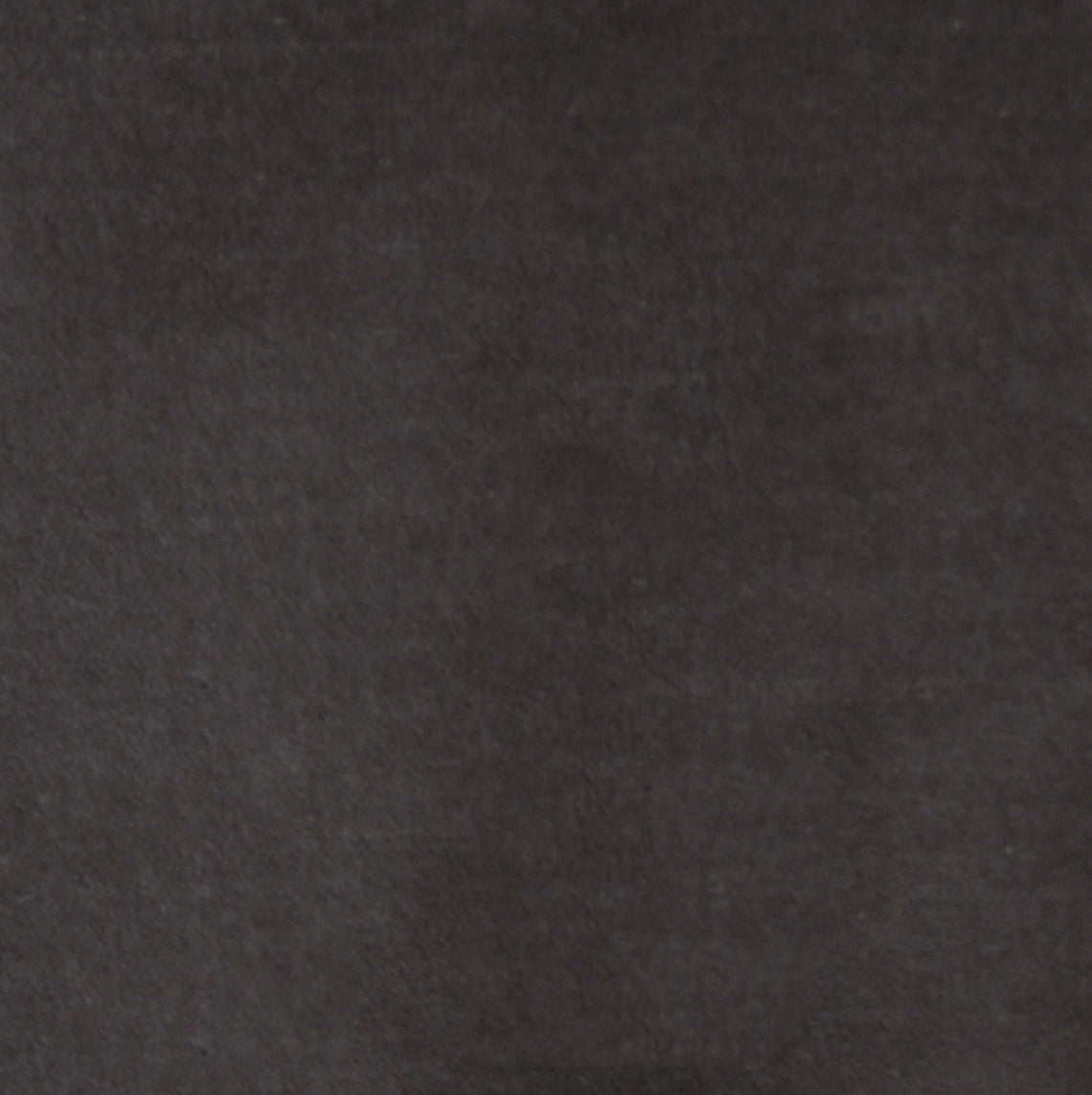 Detail of velvet fabric yardage in dark gray.