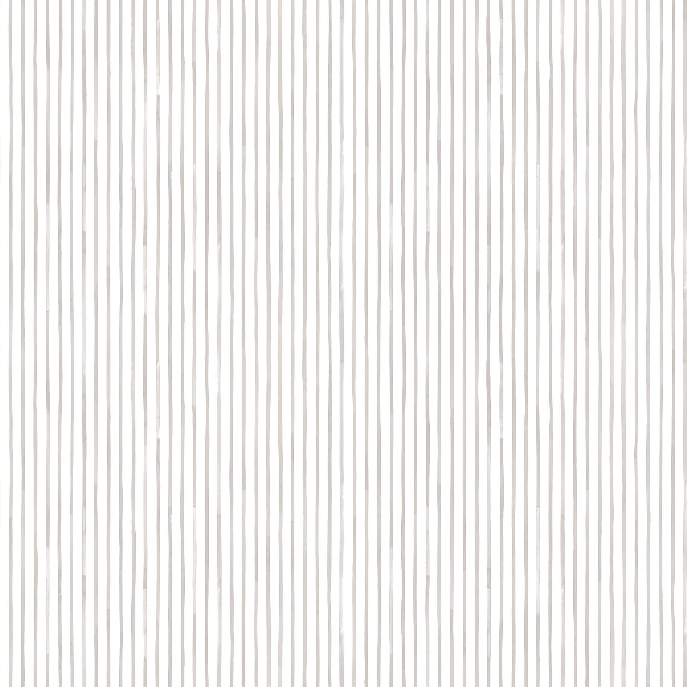 Detail of fabric in a painterly stripe pattern in light gray on a white field.