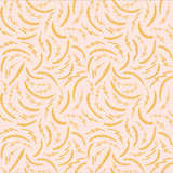 Pattern of gold swirls on a beige background