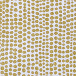 Detail of wallpaper in a painterly dotted print in mustard on a white field.