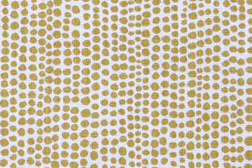 Detail of wallpaper in a painterly dotted print in mustard on a white field.