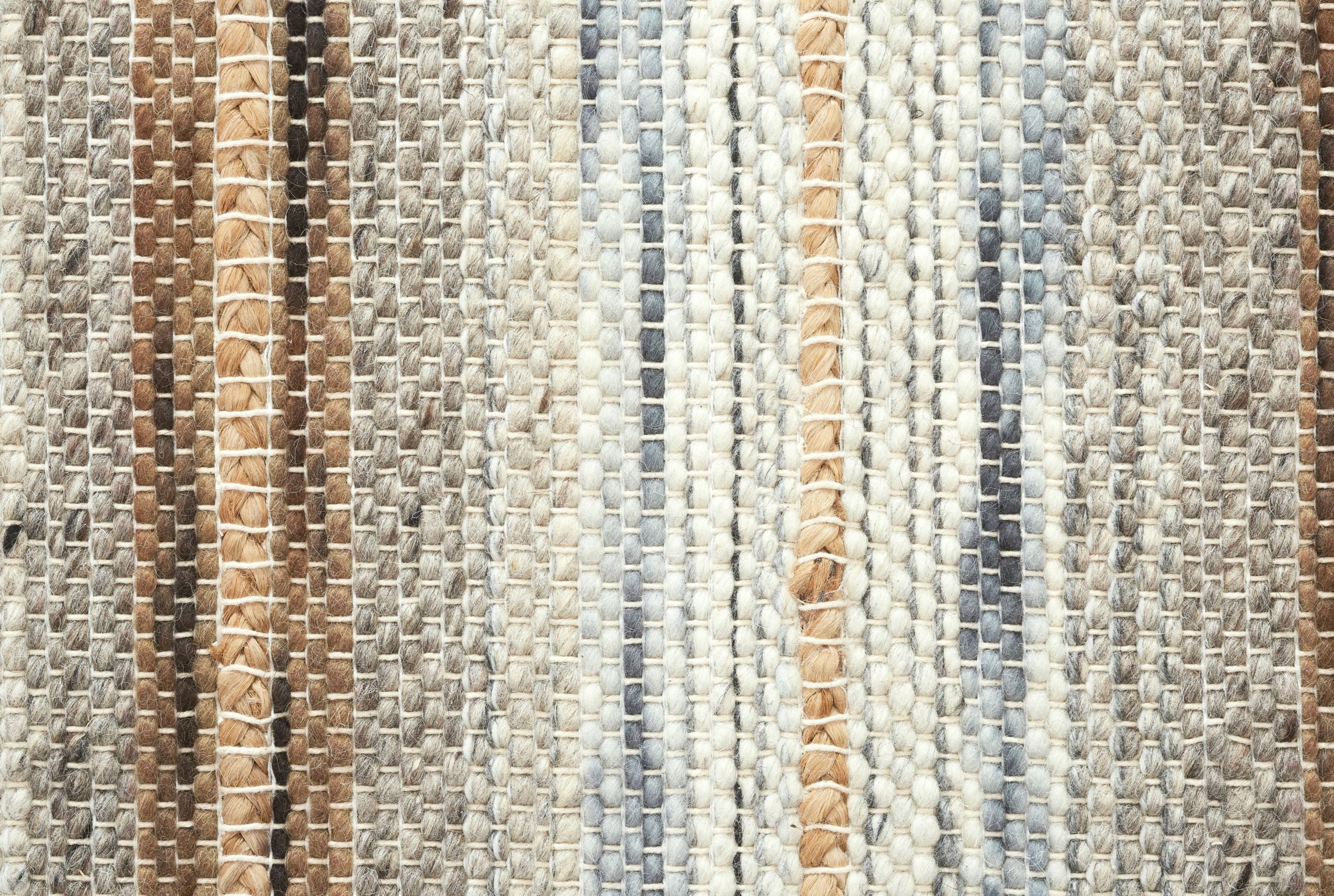Broadloom carpet fabric with stripes in beige, brown, and gray.