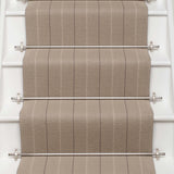 Striped flatweave runner in light grey on white staircase