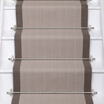 Striped flatweave runner in grey and dark grey on white staircase