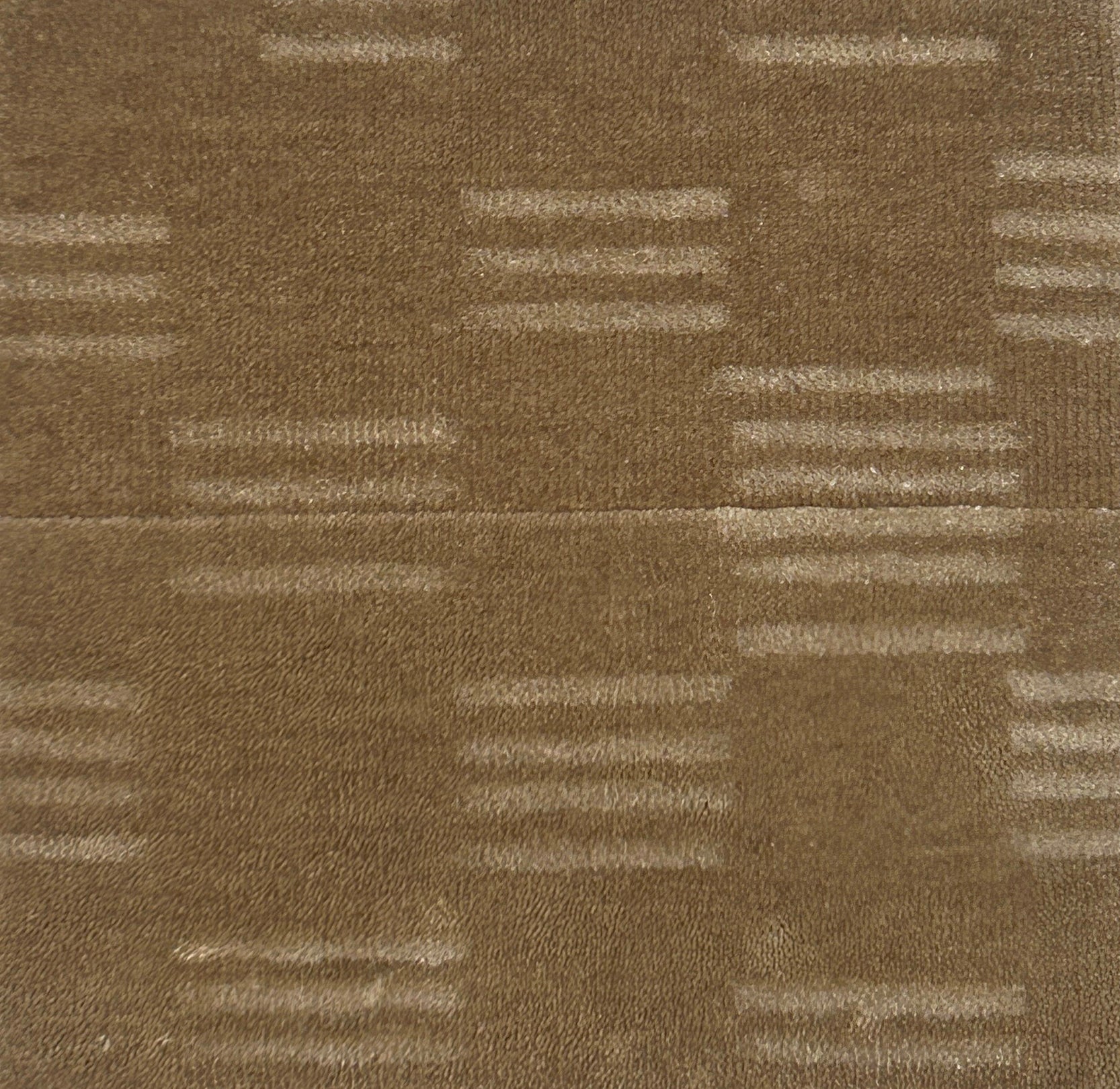 Brown carpet texture with a subtle pattern
