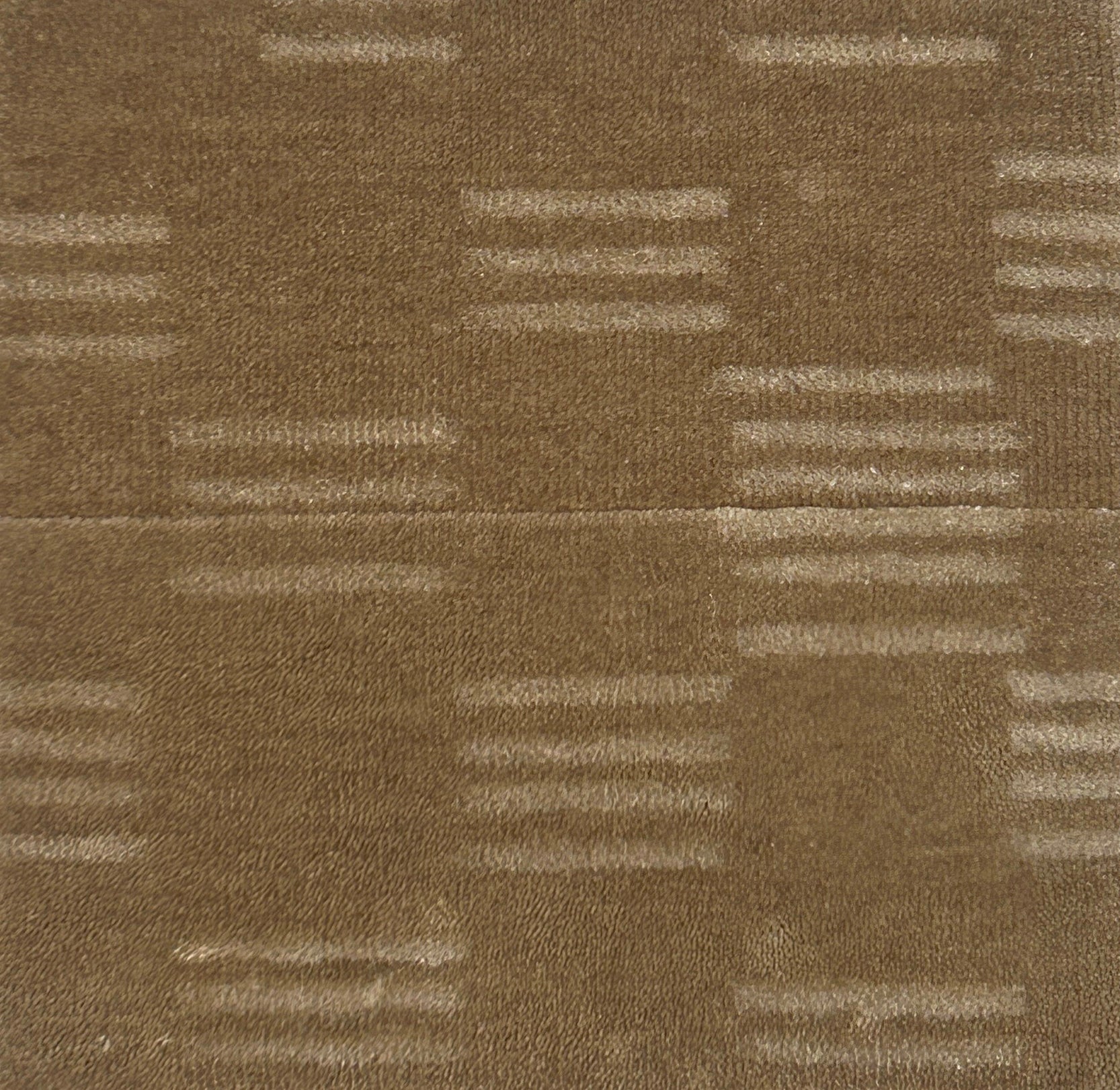 Brown carpet texture with a subtle pattern