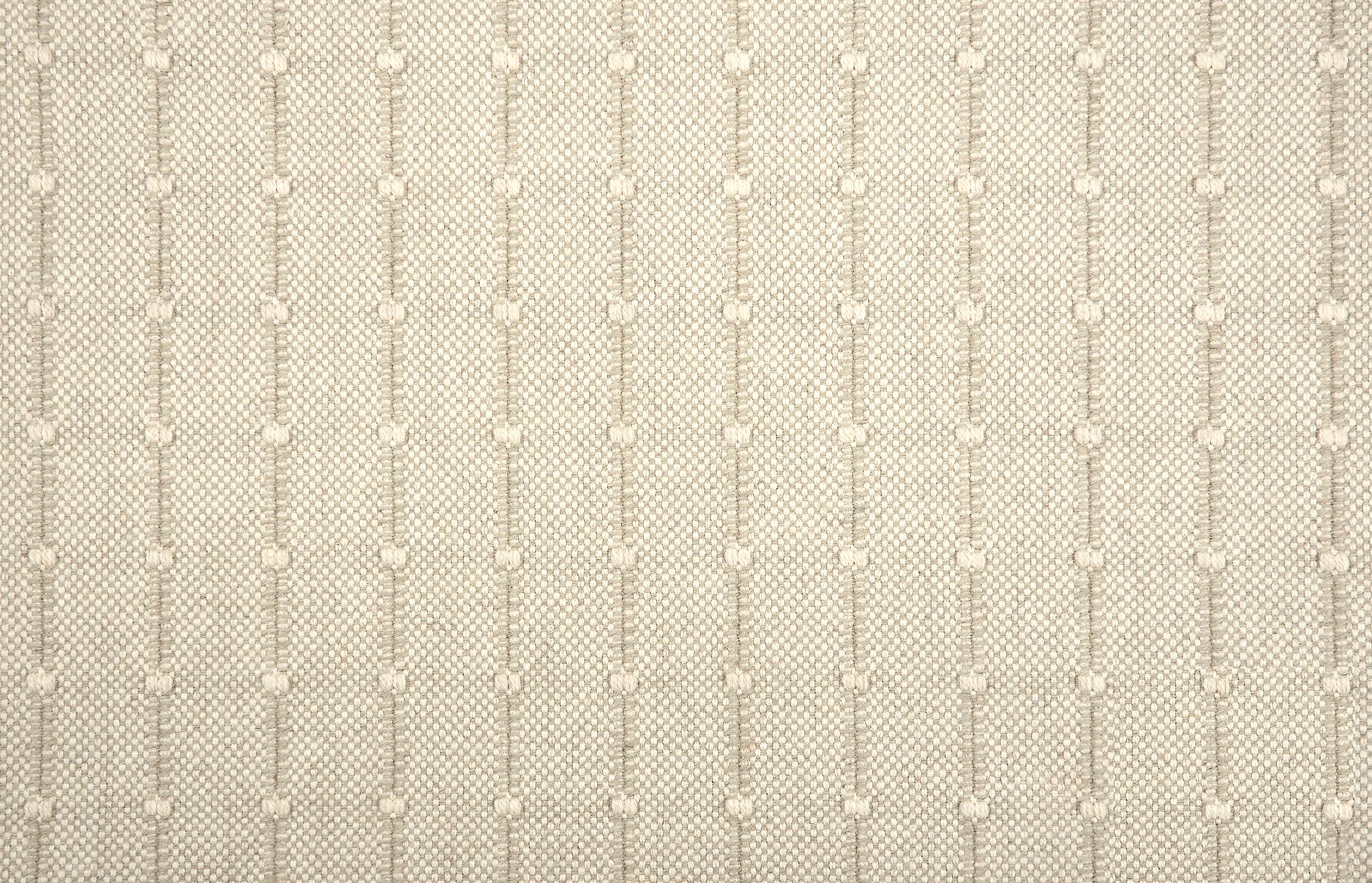 Broadloom carpet swatch with a vertical dotted stripe in beige. 