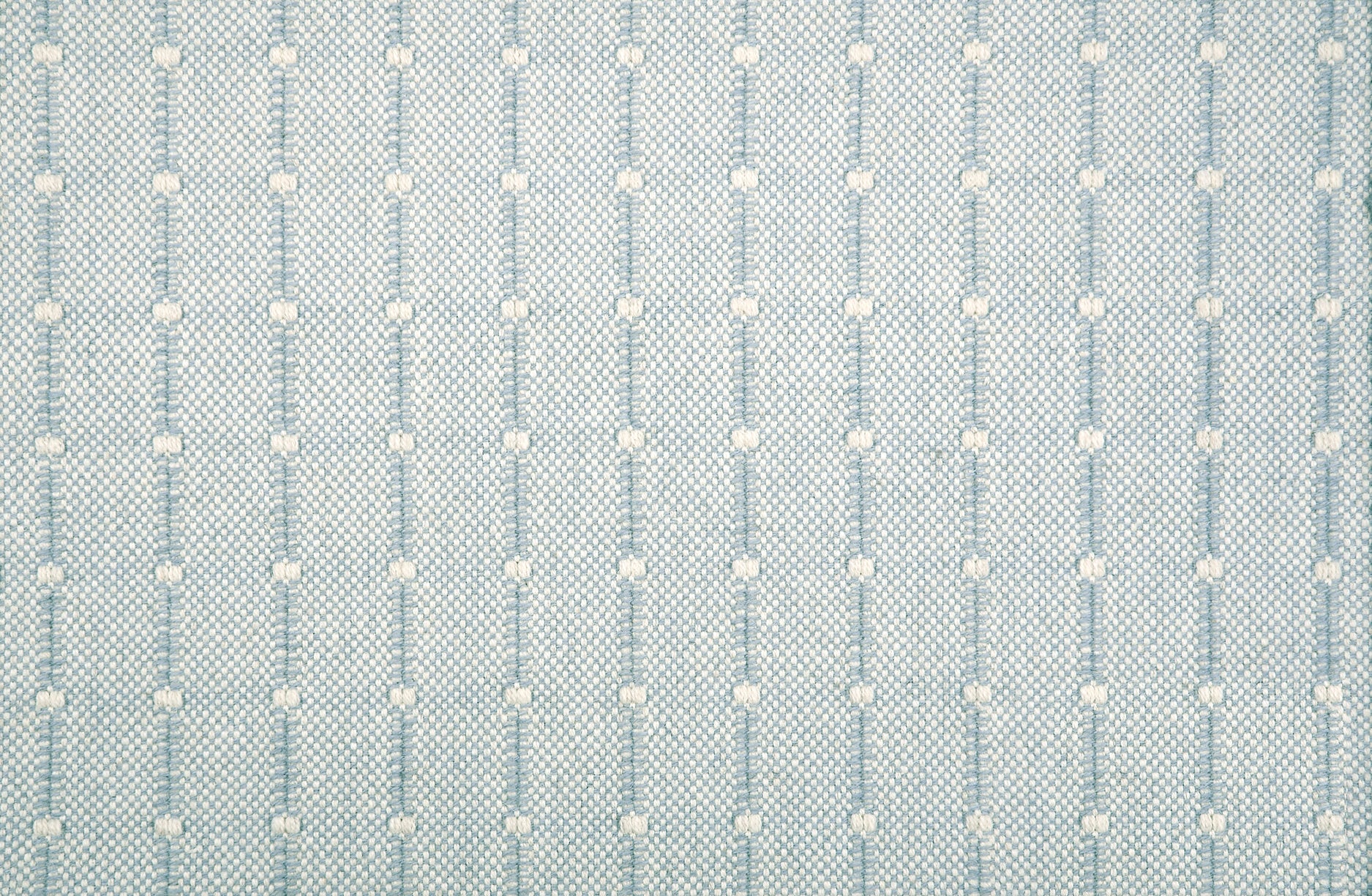 Broadloom carpet swatch with a vertical dotted stripe in blue and cream. 