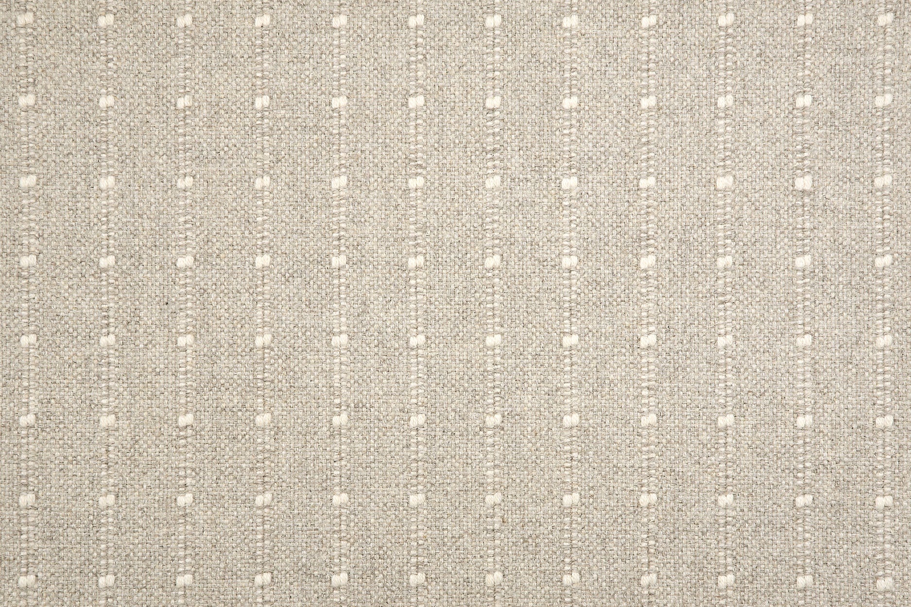 Broadloom carpet swatch with a vertical dotted stripe in grey and ivory. 