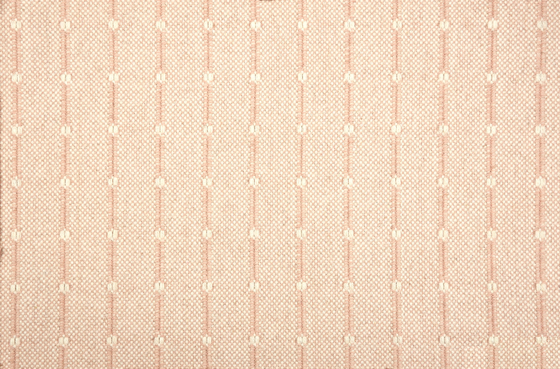 Broadloom carpet swatch with a vertical dotted stripe in pale pink and white. 