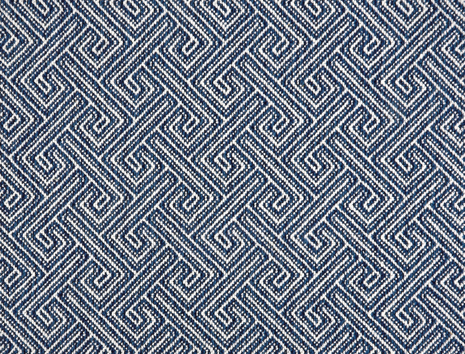 Broadloom carpet with Greek key pattern in cream on navy blue.