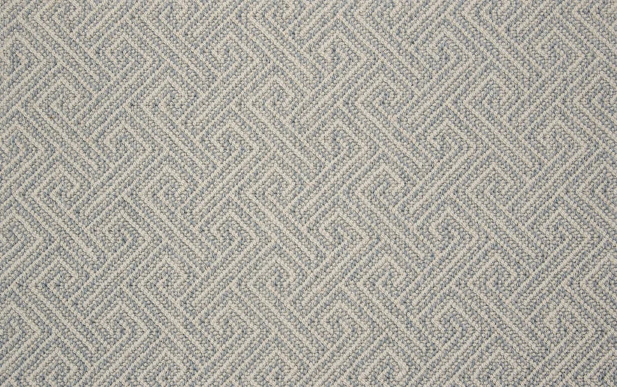 Broadloom carpet swatch in wavy geometric pattern light grey blue color