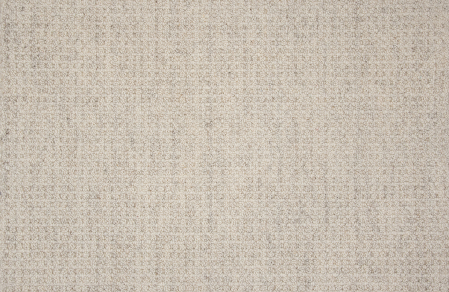 Textural broadloom carpet in cream.