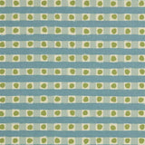 Detail of fabric in a playful dotted check print in green and blue on a cream field.