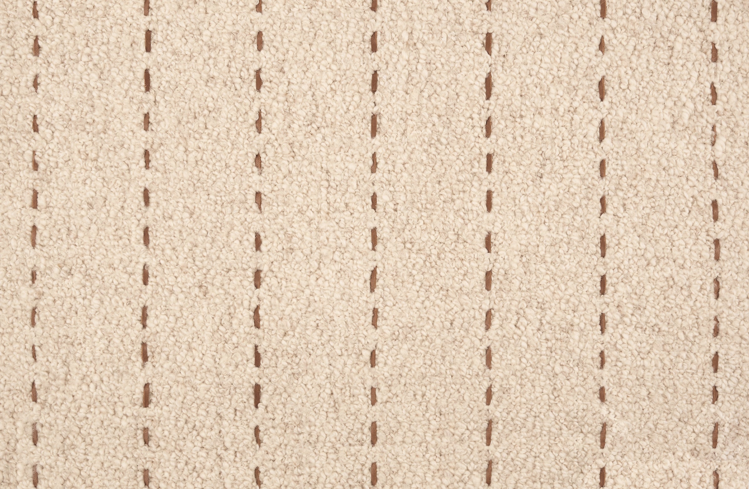 Broadloom carpet with a thin dashed stripe in brown leather on a cream field