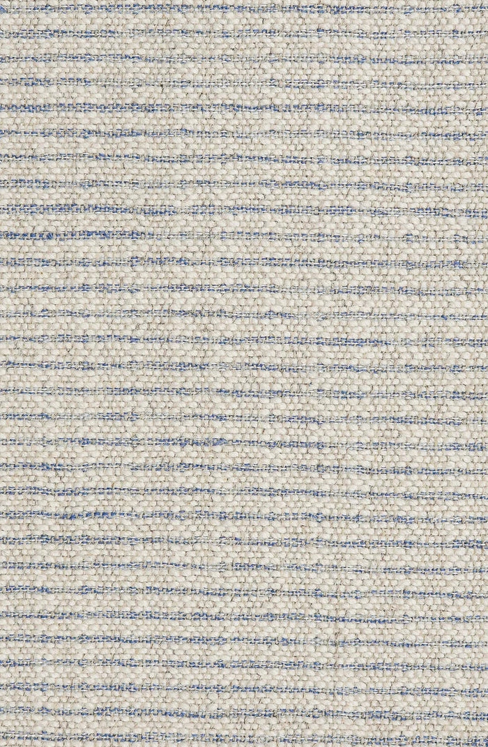 Textured broadloom carpet in a stripe pattern of cream and light blue.
