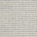 Textured broadloom carpet in a stripe pattern of cream and light blue.