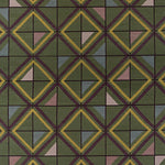 Geometric patterned rug with green, yellow, and purple colors.