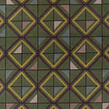 Geometric patterned rug with green, yellow, and purple colors.