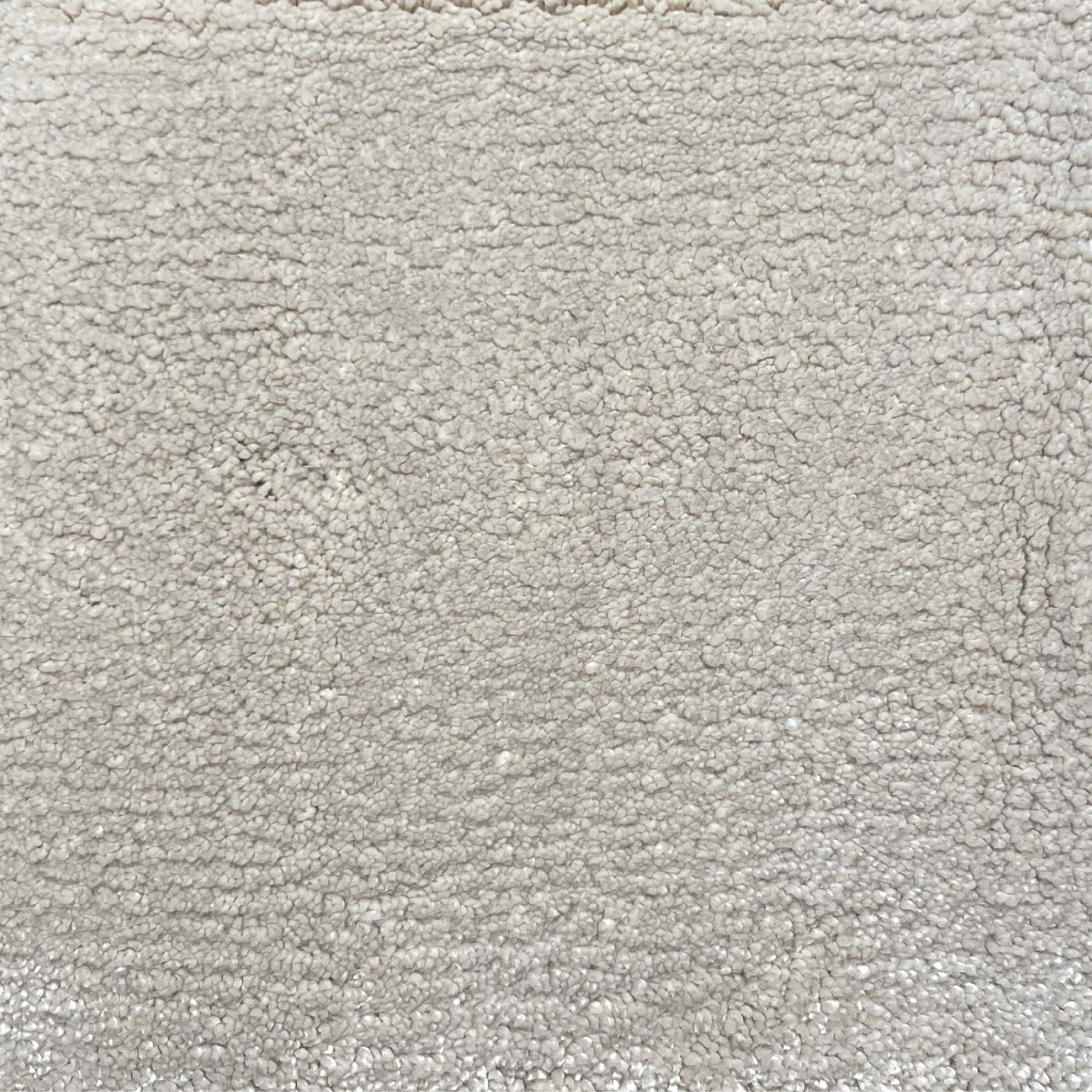 Broadloom carpet in cut pile in cool grey. 