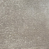 Broadloom carpet in cut pile in cool grey. 