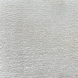 Broadloom carpet in cut pile in cool white. 