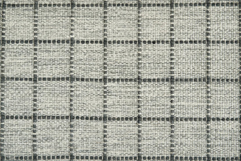 Broadloom carpet swatch in a checkered pattern in a grey design