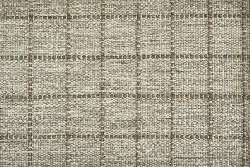 Broadloom carpet swatch in a checkered pattern in a grey multi design