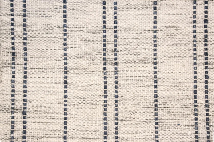 Broadloom carpet swatch in a striped pattern in a blue white design