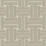 Detail of wallpaper in a large-scale interlocking geometric print in tan on a cream field.