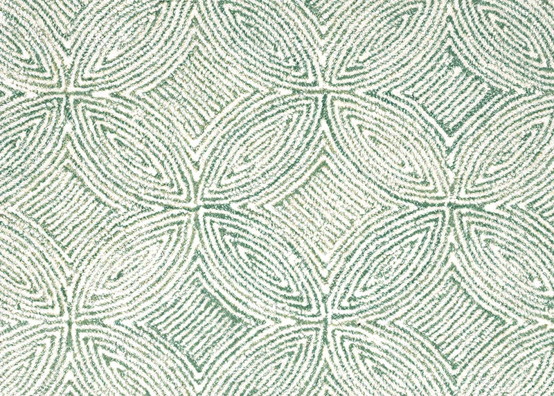 Broadloom carpet in a circular mosaic design in dense stripes of white and green.