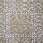 Broadloom carpet in wide box checkerboard pattern in tan and cream. 