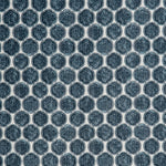 Detail of a printed linen fabric in a repeating knotted pattern in indigo on a white field.