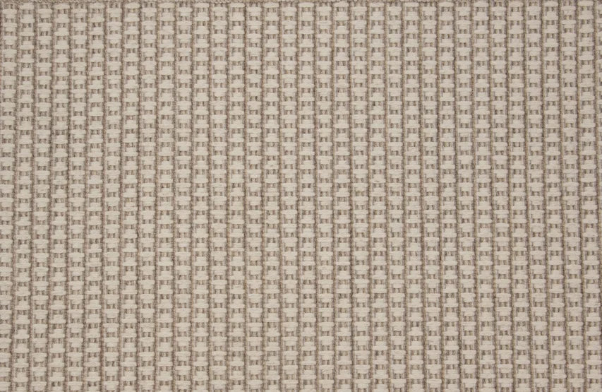 Broadloom carpet swatch in a textured pattern light grey tan color
