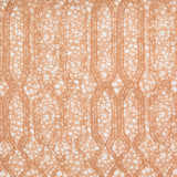 Printed fabric with monochomatic geometric stripe and mottled textural background in shades of orange.
