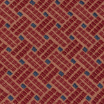 Detail of an embroidered fabric in a dashed basketweave design in red with blue accents.
