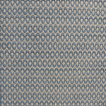 Handwoven wool with textural oval pattern in blue on a beige field. 