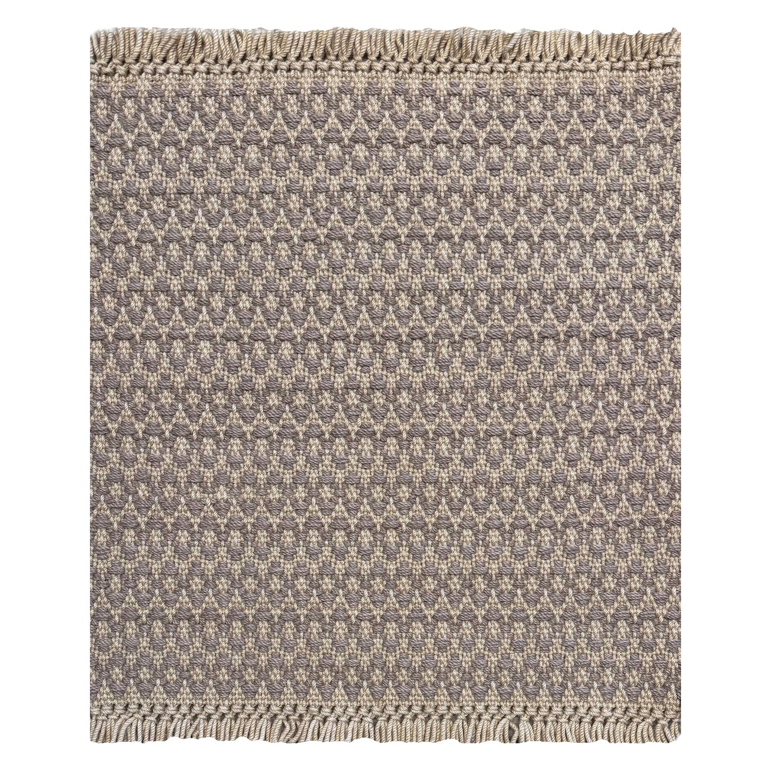 A woven rug sample with a grey and cream geometric oval pattern and fringed edges, shown flat against a white background.