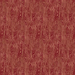 Scaled-out view of wallpaper in a textural wood grain print in coral on a red field.