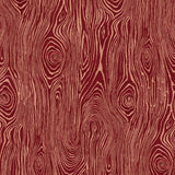 Detail of wallpaper in a textural wood grain print in coral on a red field.