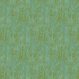 Scaled-out view of fabric in a textural wood grain print in green on a turquoise field.