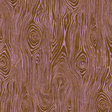 Detail of wallpaper in a textural wood grain print in purple on a brown field.