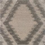 Handknotted rug with raised geometric pattern in grey. 