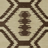 Handwoven rug with geometric pattern in brown and beige