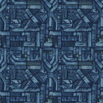 Detail of fabric in an absract geometric pattern in shades of blue and navy.