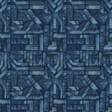 Detail of fabric in an absract geometric pattern in shades of blue and navy.