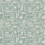 Detail of fabric in an absract geometric pattern in shades of cream and turquoise.