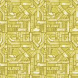 Detail of fabric in an absract geometric pattern in shades of yellow.