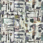 Detail of fabric in an abstract layered paint blotch print in shades of gray, white, olive and purple.